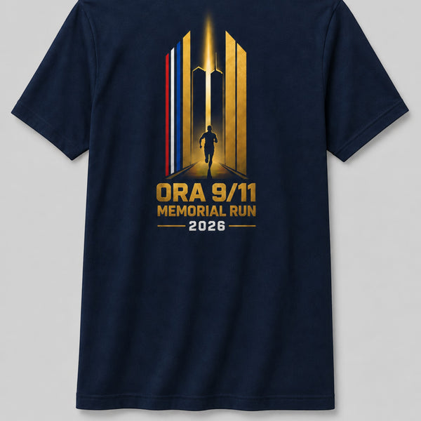 Shockwave navy 9-11 Memorial Run 2026 t-shirt with commemorative runner graphic on the back